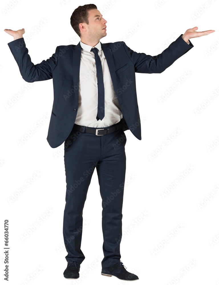Businessman standing with arms out Businessman standing with arms out