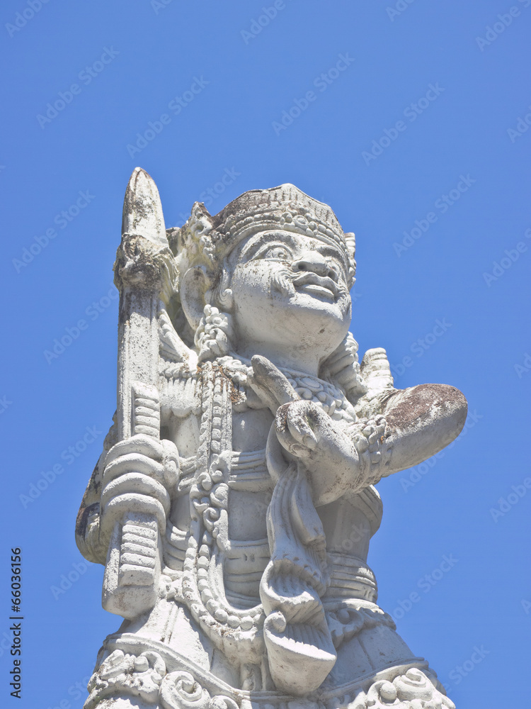 Half body portrait of Balinese Deva statue in Bali, Indonesia