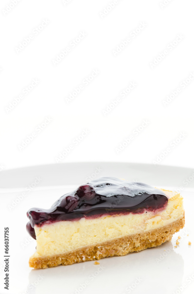 Blueberry cheesecake isolated white background Blueberry cheesecake isolated white background