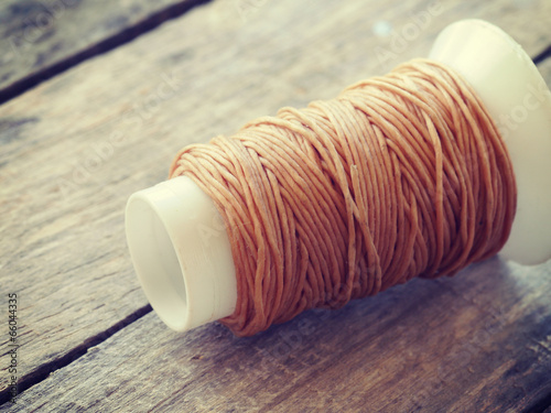 coil of coarse rope on wood old retro vintage style