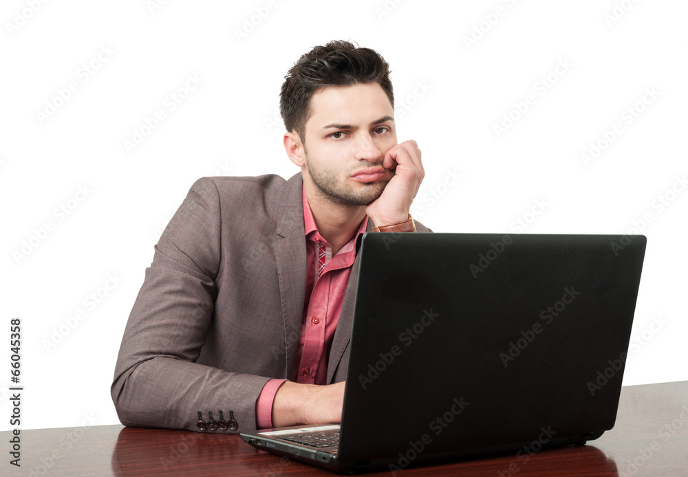 Young business man with a laptop. Young business man with a laptop.