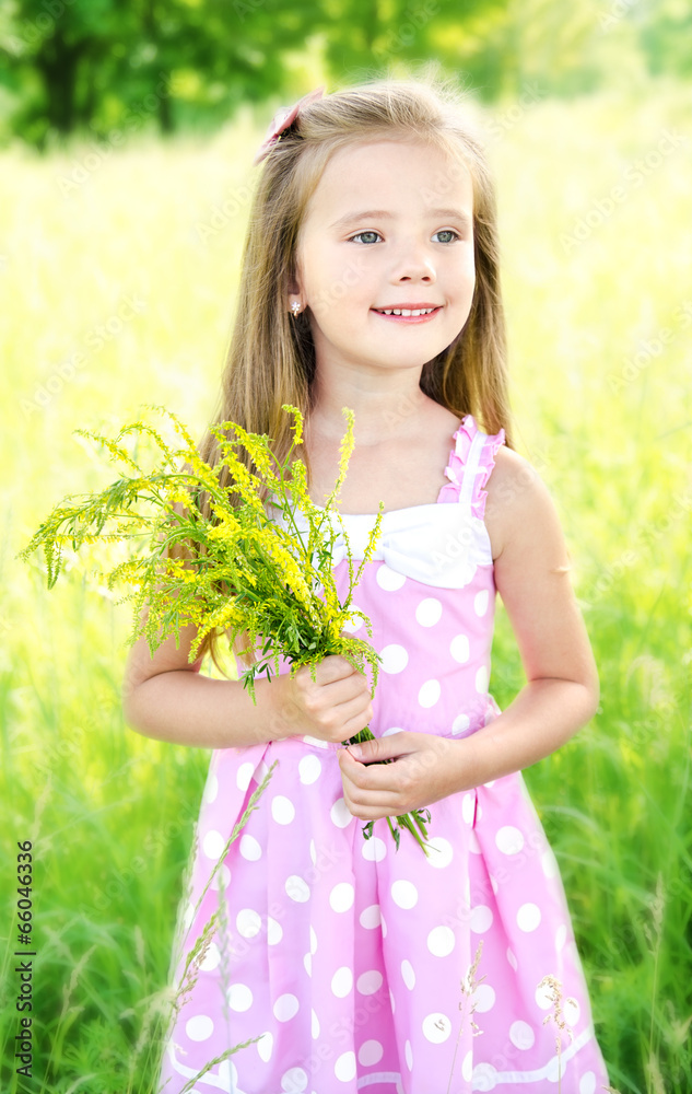 Portrait of adorable smiling little girl with flowers Portrait of adorable smiling little girl with flowers