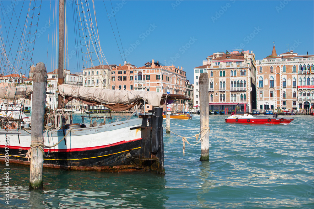 VENICE, ITALY - MARCH 13, 2014: Sailboat and Canal Grande.