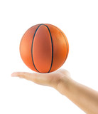 Hand holding basketball or basket ball isolated
