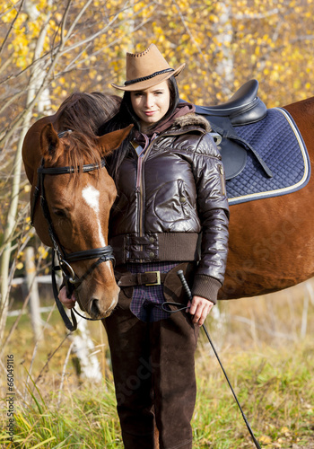 equestrian with her horse in autumnal nature © Richard Semik