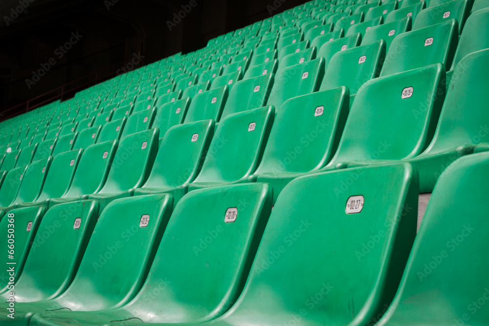 Fototapeta premium Perspective of many empty stadium seats
