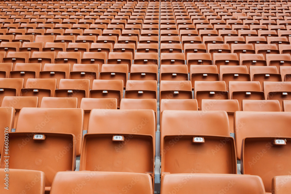 Perspective of many empty stadium seats Perspective of many empty stadium seats