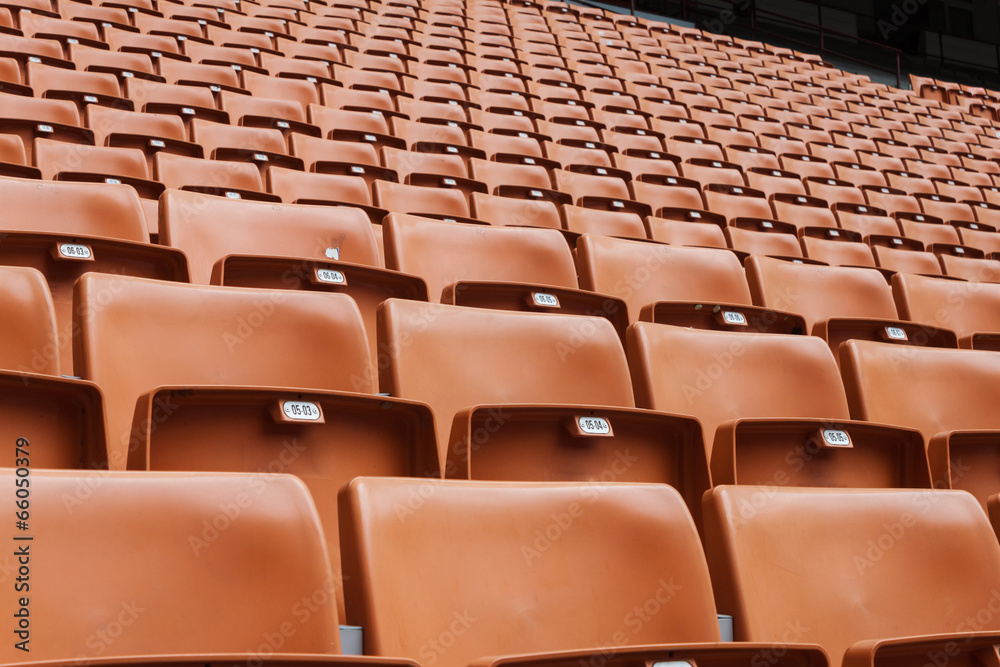 Fototapeta premium Perspective of many empty stadium seats