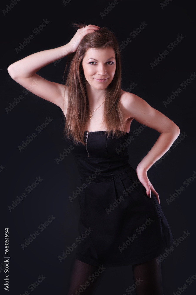 Beautiful young woman in black dress Beautiful young woman in black dress