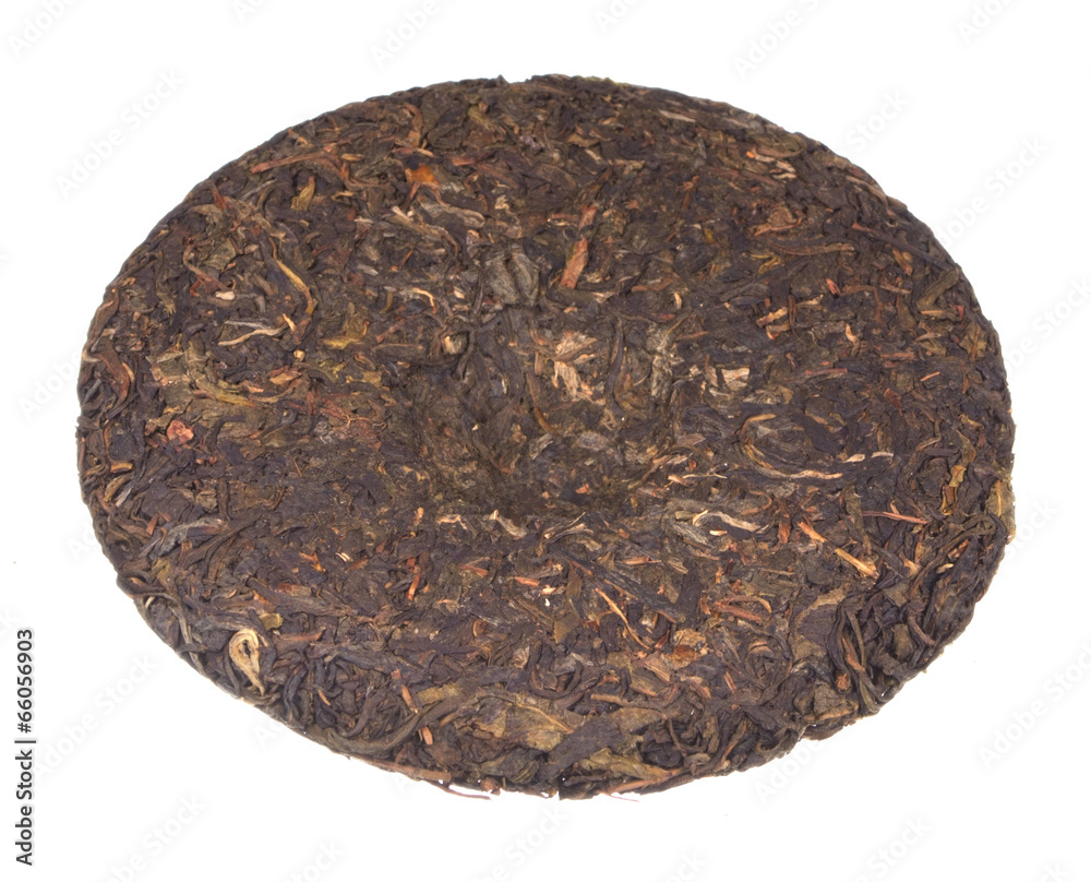 Disc of chinese puer tea isolated on white background Disc of chinese puer tea isolated on white background