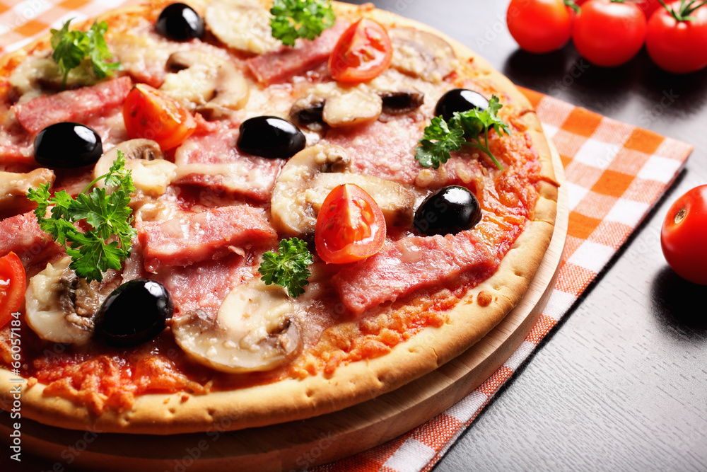 Pizza with Ham, Mushrooms, olives and parsley