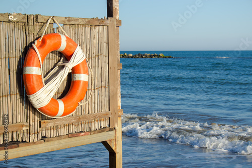 life buoy on lifeguard tower photo