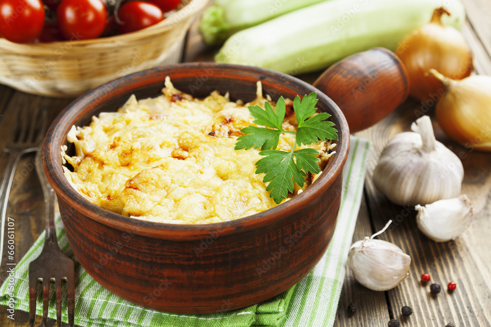 Courgettes baked with tomato and cheese Courgettes baked with tomato and cheese