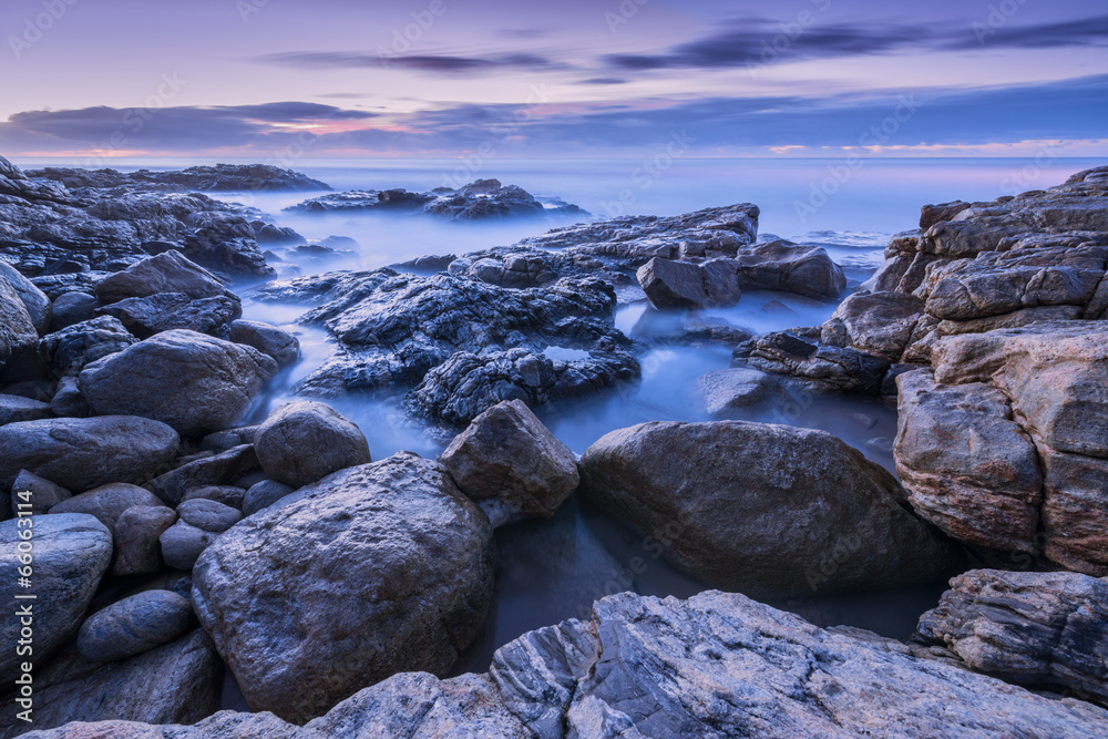 Misty waves crashing on the rocks in South Africa