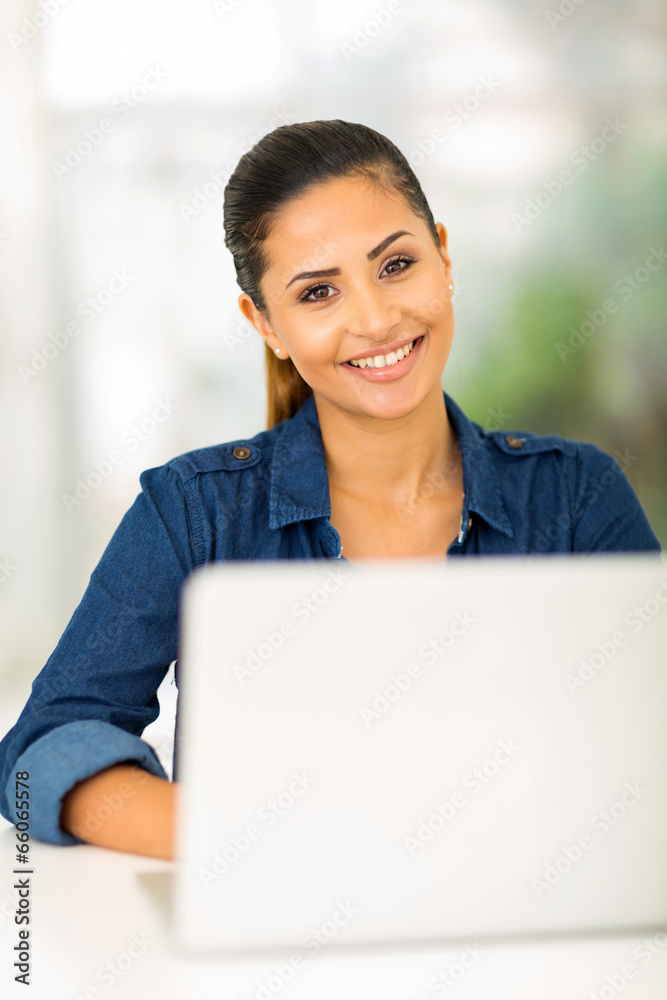 college girl using laptop computer college girl using laptop computer