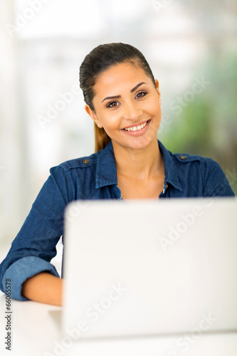 Free Download college girl using laptop computer - GFXLoad