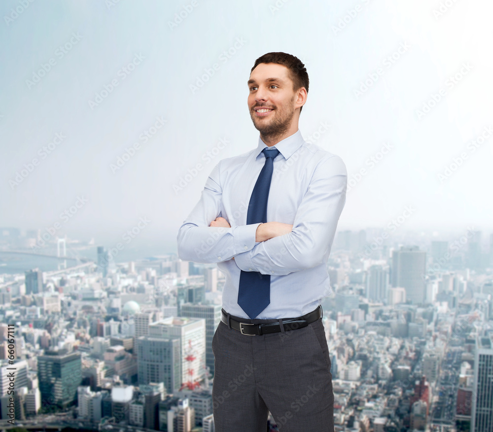 handsome businessman with crossed arms handsome businessman with crossed arms