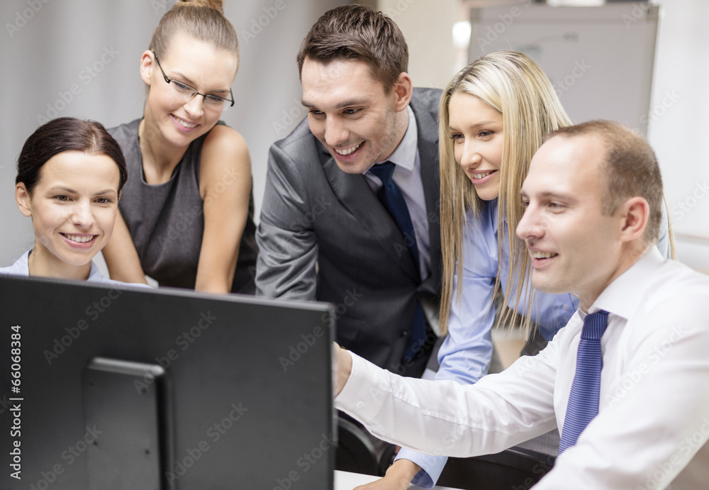 business team with monitor having discussion business team with monitor having discussion