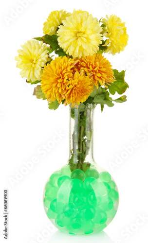 Beautiful flowers in vase with hydrogel isolated on white © Africa Studio