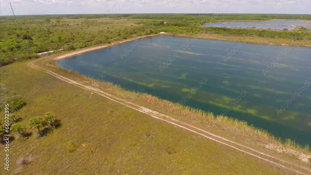 Man made lake aerial video Man made lake aerial video