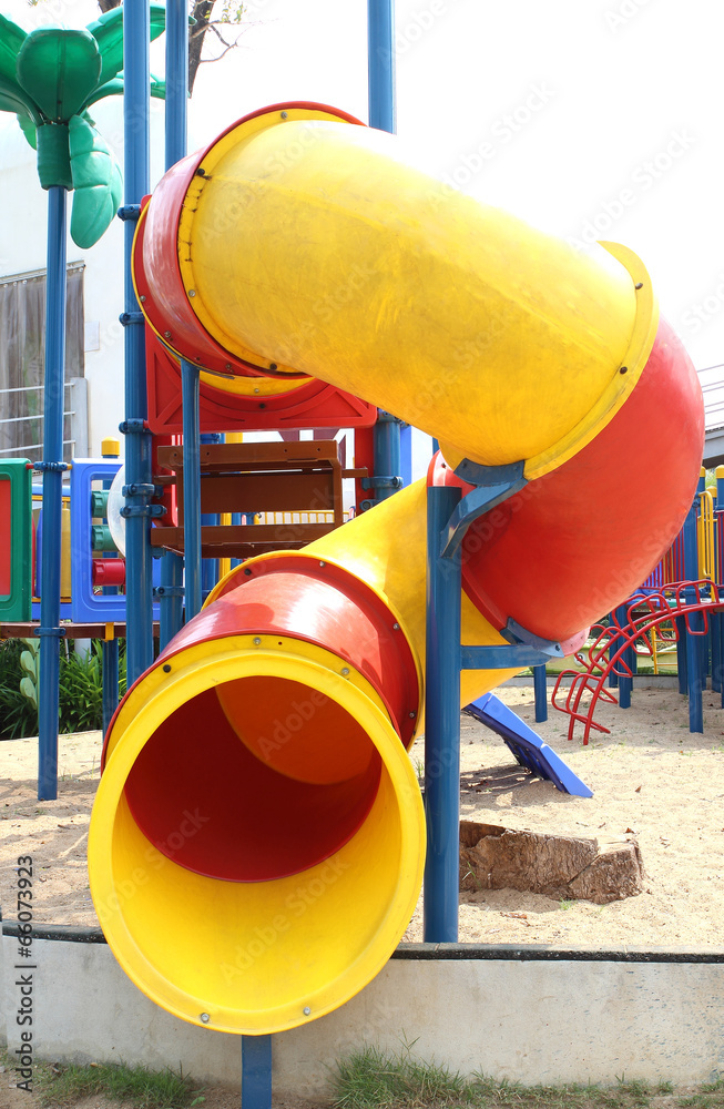 a colorful children's playground in suburban area
