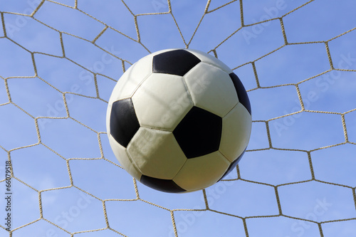 foot ball in the goal net © kungverylucky