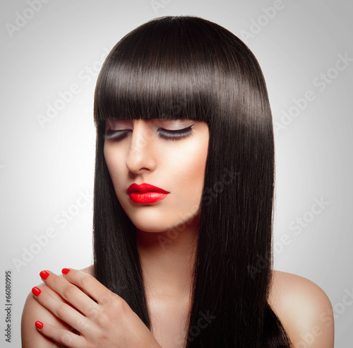 Portrait of beautiful fashion woman with long healthy brown hair