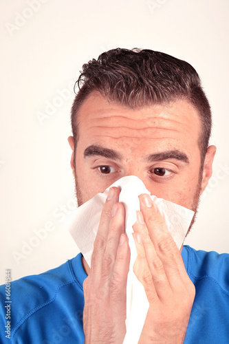 Man with handkerchief in the nose