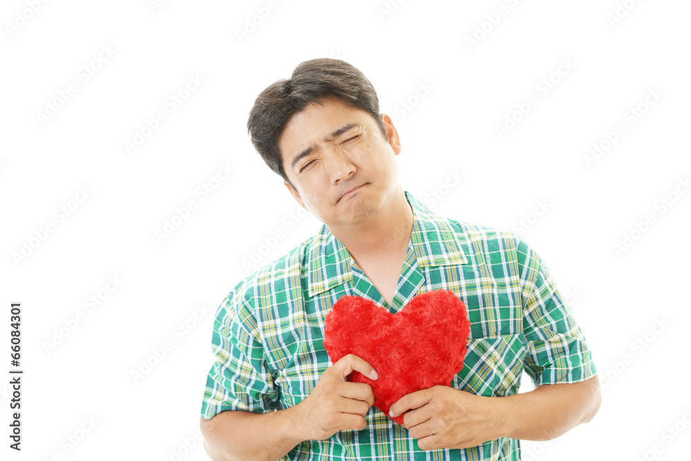 疲れた表情の男性