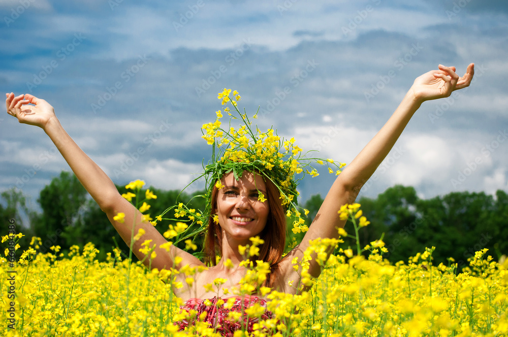 Naklejka premium Beautiful young woman in a raps field