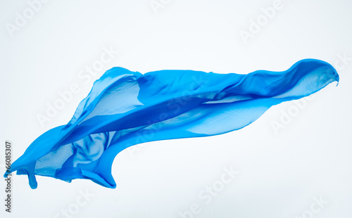 abstract piece of blue fabric flying