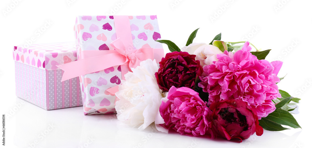 Beautiful peonies and gift boxes, isolated on white Beautiful peonies and gift boxes, isolated on white