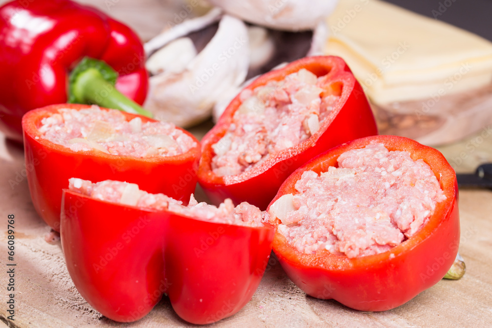 Stuffed red pepper with meat mushrooms and onion
