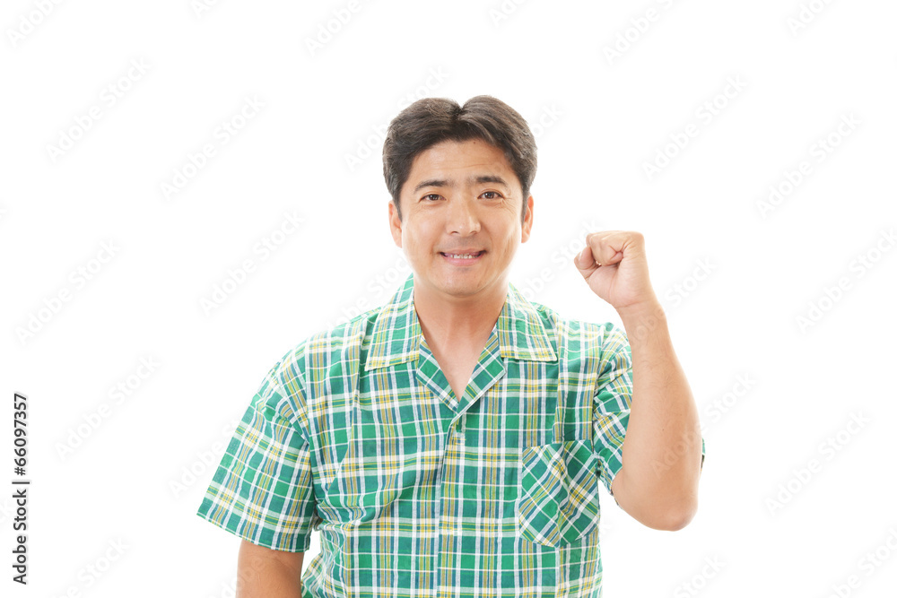 ガッツポーズの男性