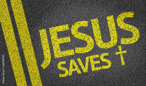 Jesus Saves written on the road