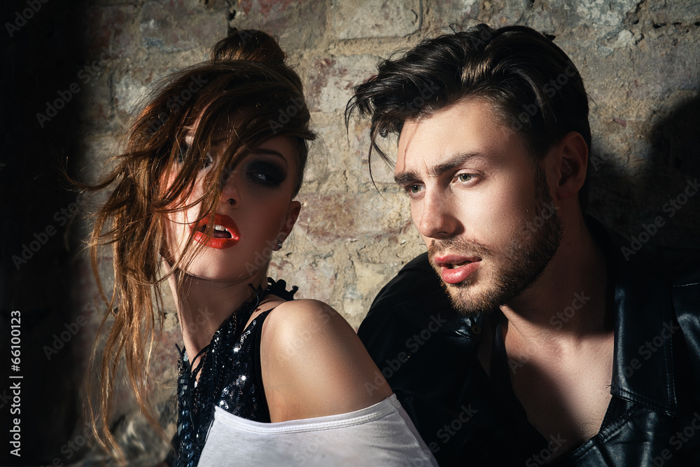 Fashion photo of sexy elegant couple in the tender passion Fashion photo of sexy elegant couple in the tender passion