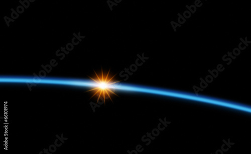 Sunrie over fuzy Earth's atmosphere photo