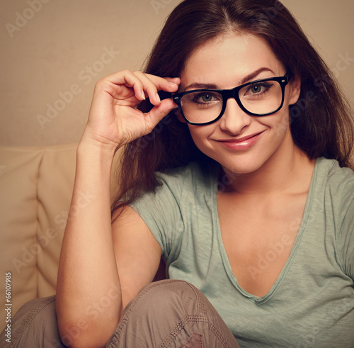 Beautiful young woman holding glasses. Closeup vintage