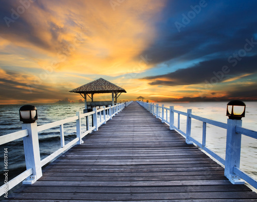 wood piers and sea scene with dusky sky © stockphoto mania