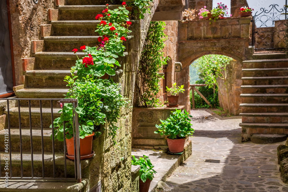 Old town full of flowery porches in Tuscany