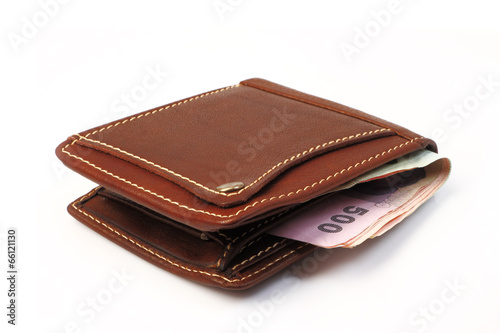 Brown leather wallet with money isolated on white