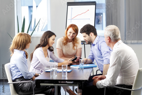 Business people discussing at meeting