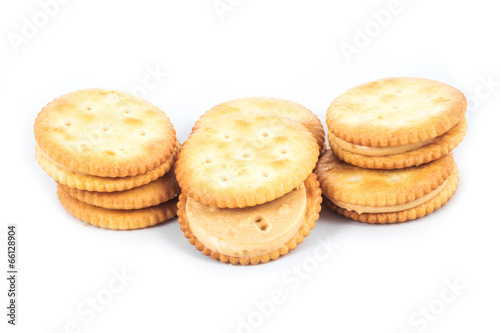 Peanut butter cream and biscuit in white background