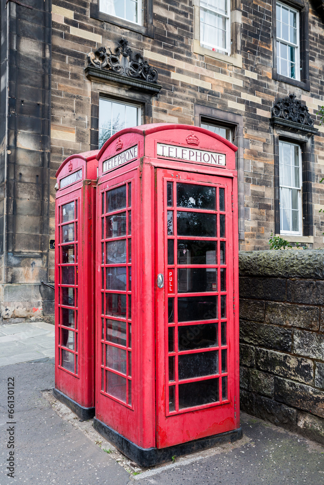 Classic red British telephone box in Edinburgh Classic red British telephone box in Edinburgh