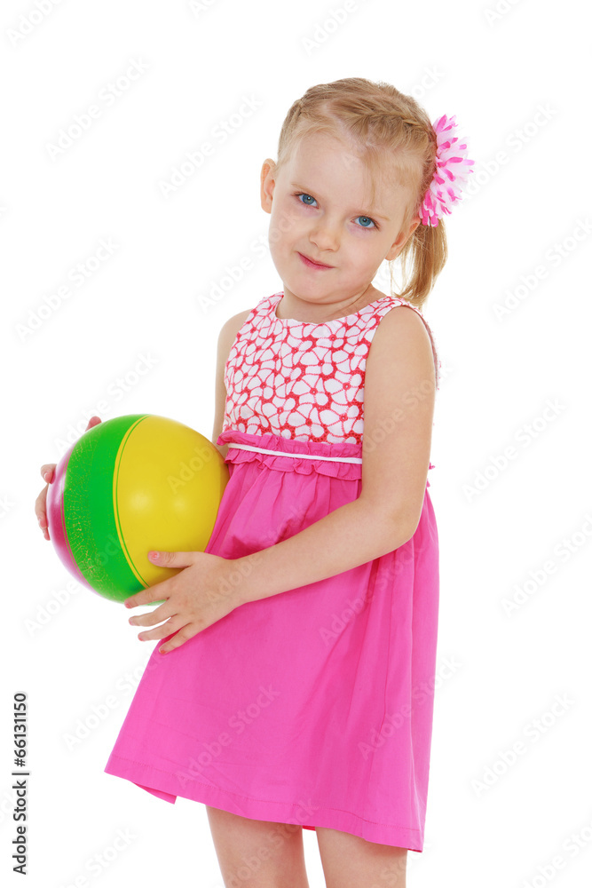 Little girl with the ball