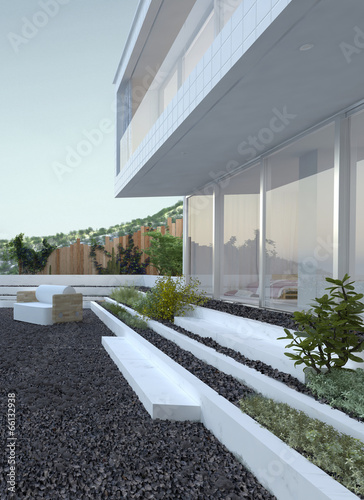 Принти на полотні Pebble patio in front of a modern house