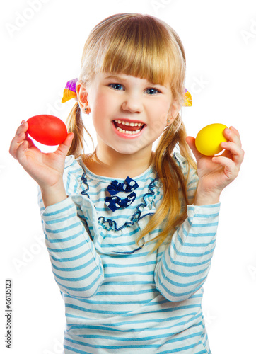 sweet little girl with yellow Easter egg