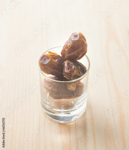 Date palm fruits or kurma, ramadan food vintage retro effect.