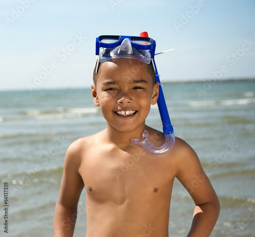 Smiling little boy with snorkel