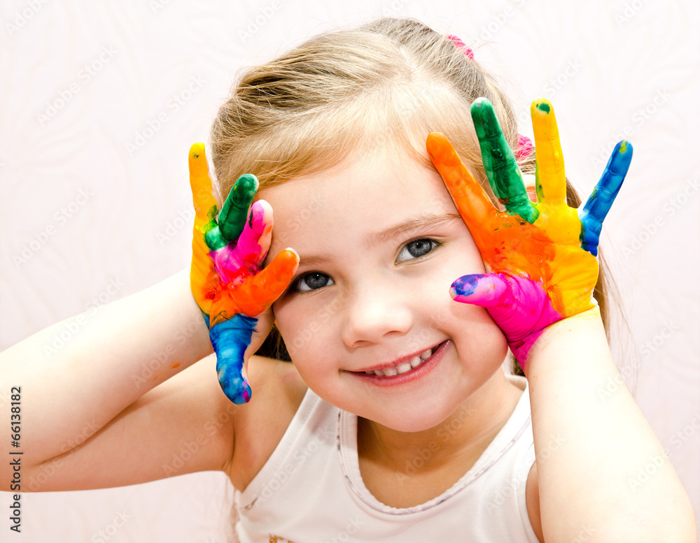 Cute smiling little girl with hands in paint Cute smiling little girl with hands in paint